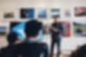 man-beside-flat-screen-television-with-p